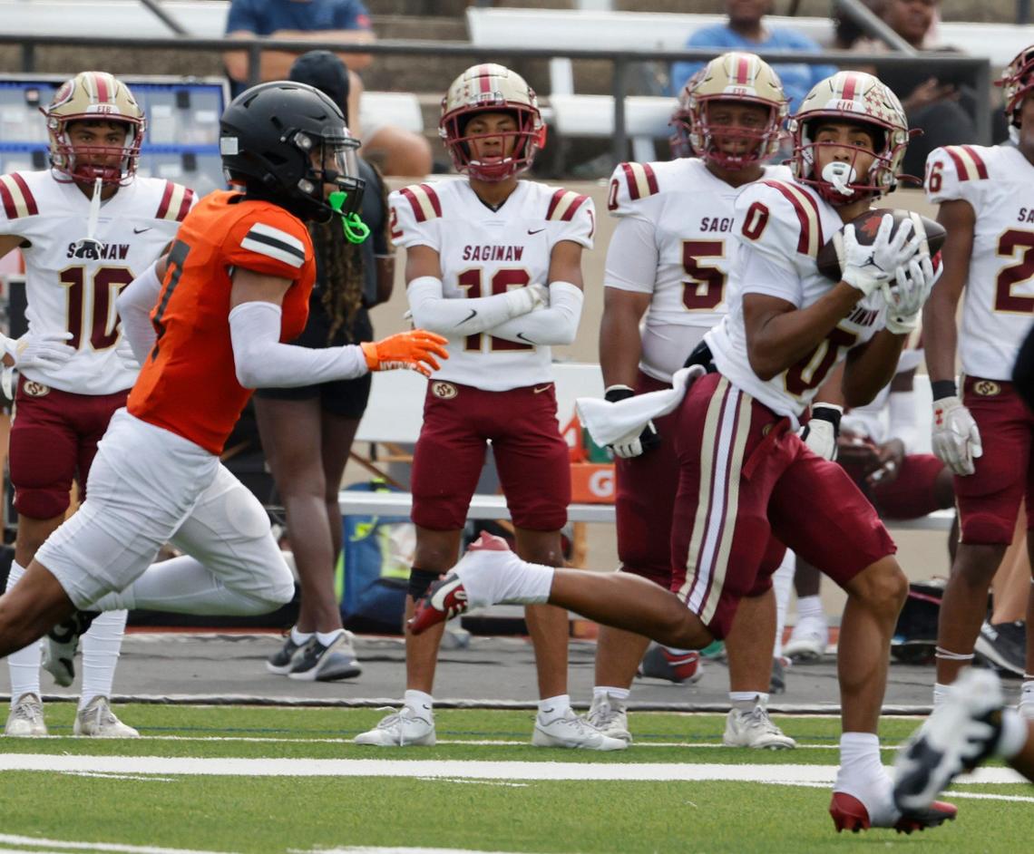 Saginaw wide receiver Aidan Collier (0) hauls in a 97 yard touchdown pass during a UIL football game at Farrington Field in Fort Worth Saturday, Sept. 14, 2024.