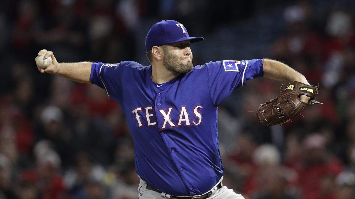 Lance Lynn allowed only two runs in seven innings for the Rangers, but one of the runs came on the first of Mike Trout's two solo homers.