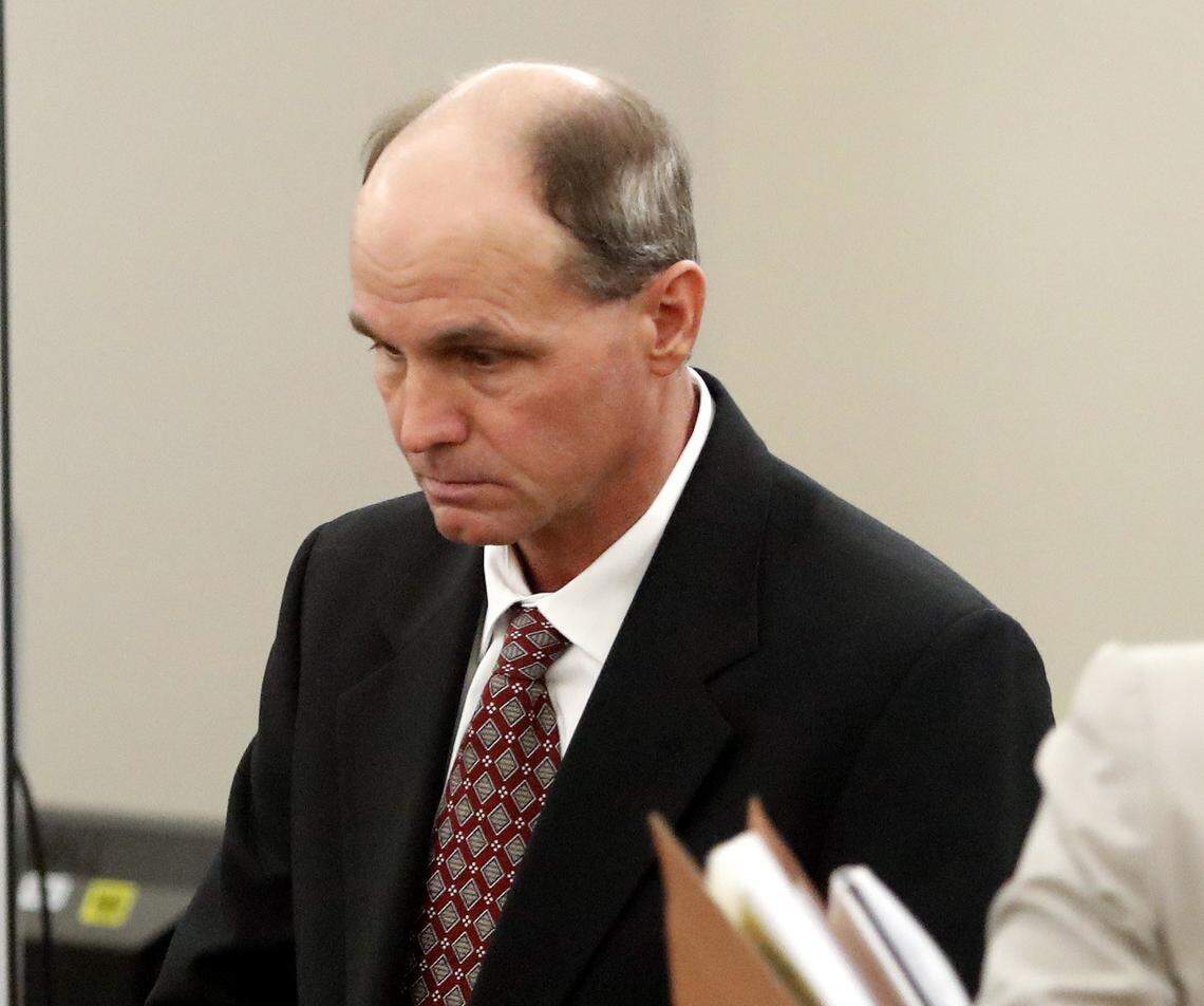 Kenneth Martin, left,  testified Monday that the fatal shooting of his estranged wife at a Southlake intersection was an accident. His murder trial continued Tuesday in a Tarrant County courtroom.