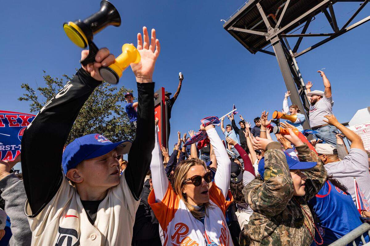 Rangers fans gather to celebrate the Texas Rangers World Series championship for the World Series Parade in front of Globe Life Field in Arlington on Friday, Nov. 3, 2023.