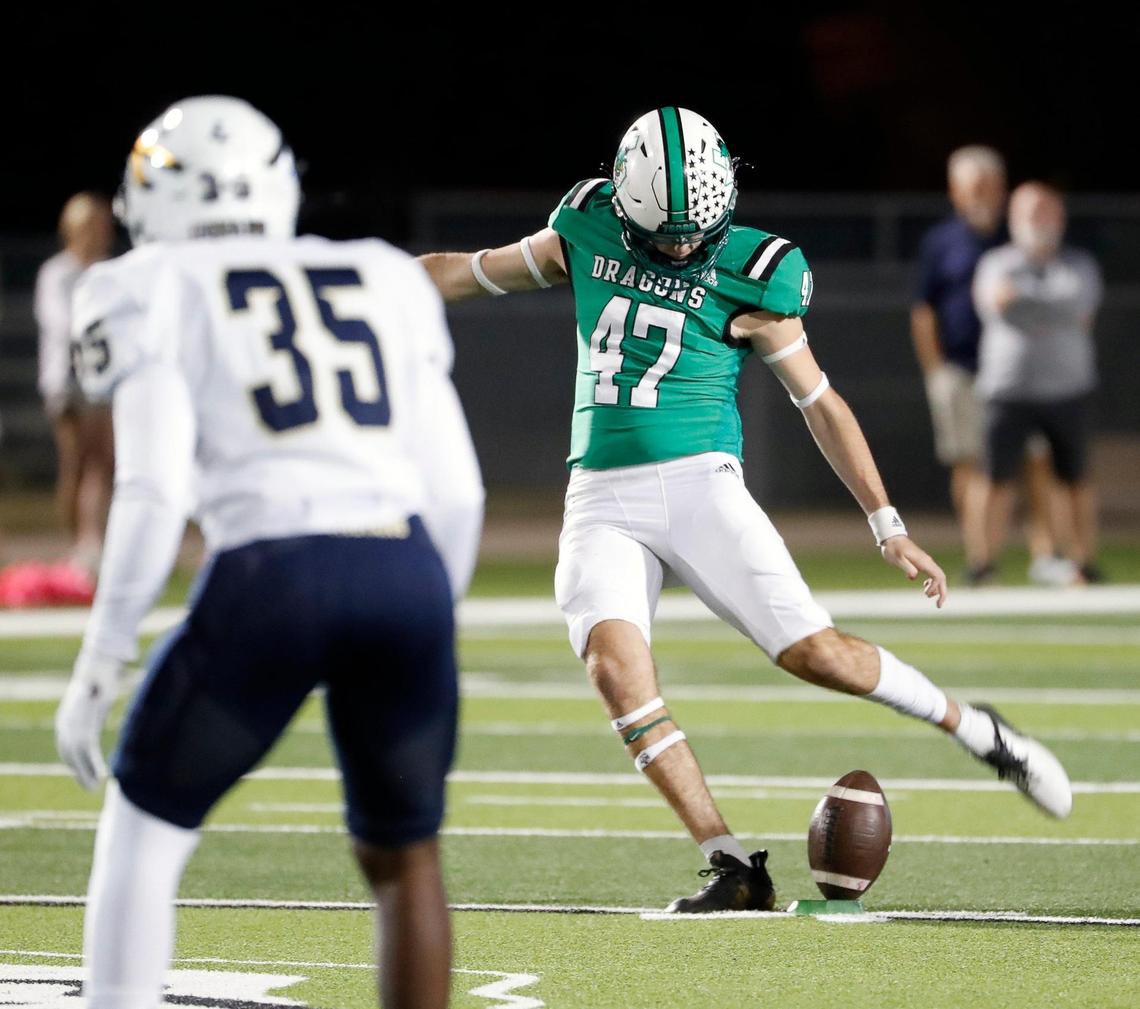 Southlake Carroll kicker Tyler White (47) kicks off in the first half of a District 4-6A high school football game at Dragon Stadium in Southlake, Texas, Friday, Oct. 07, 2022. Keller led Carroll by four at the half. (Special to the Star-Telegram Bob Booth)