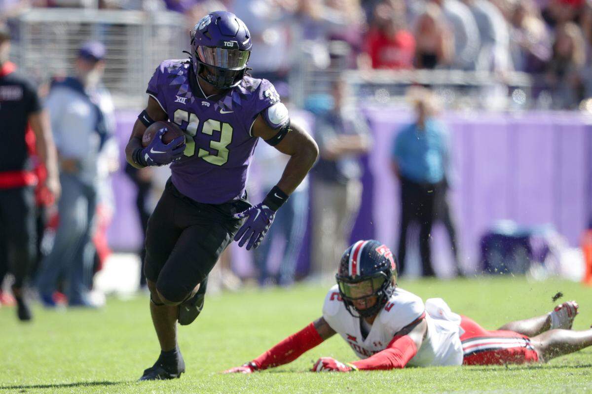TCU running back Kendre Miller outruns the Texas Tech defense during their game on Saturday, Nov. 5, 2022, at the Amon G. Carter Stadium in Fort Worth.