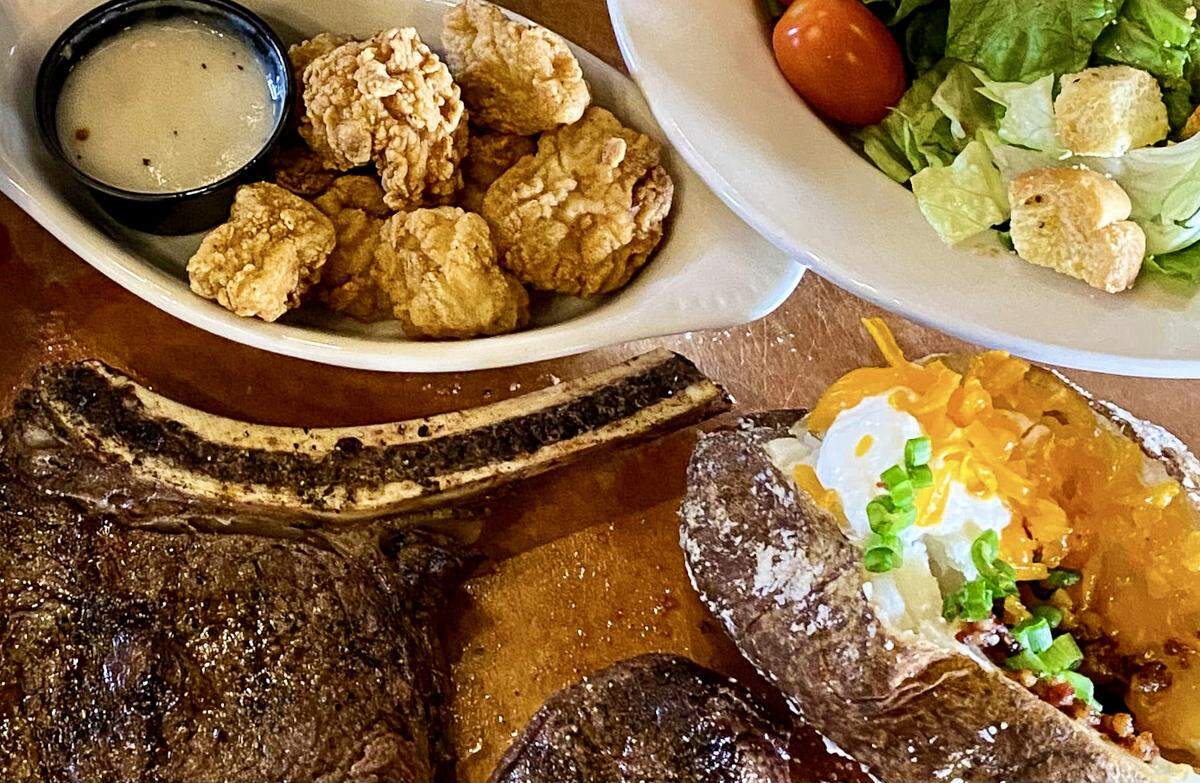 Riscky’s Steakhouse is offering a Valentine’s dinner with steaks, calf fries (top), salads and sides.