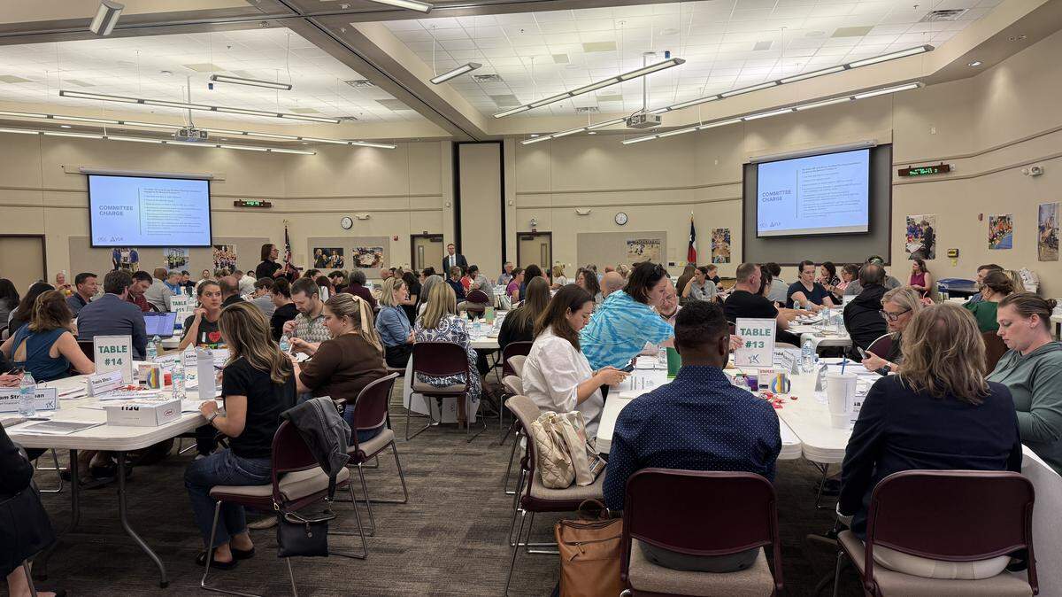 Superintendent Cory Wilson presents the districts Long-Term Planning Committee’s proposal on school closures and consolidations to staff and residents.