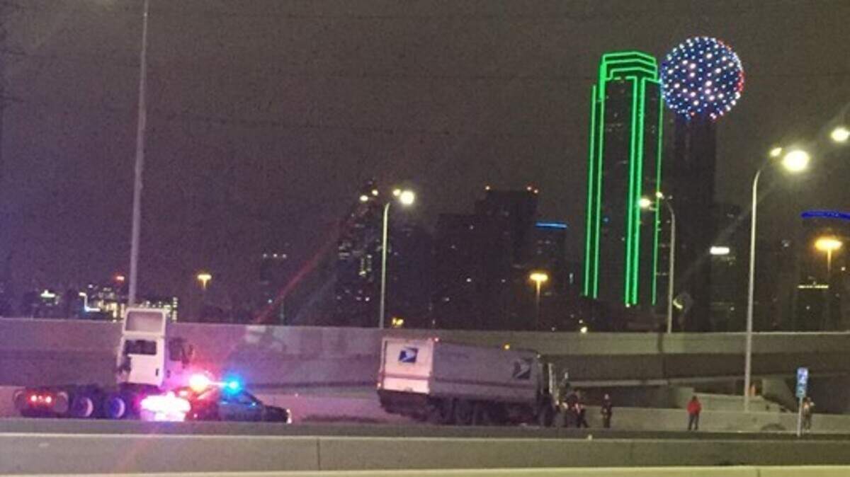 A USPS employee was shot and killed in his truck on Interstate 30 early Monday morning.