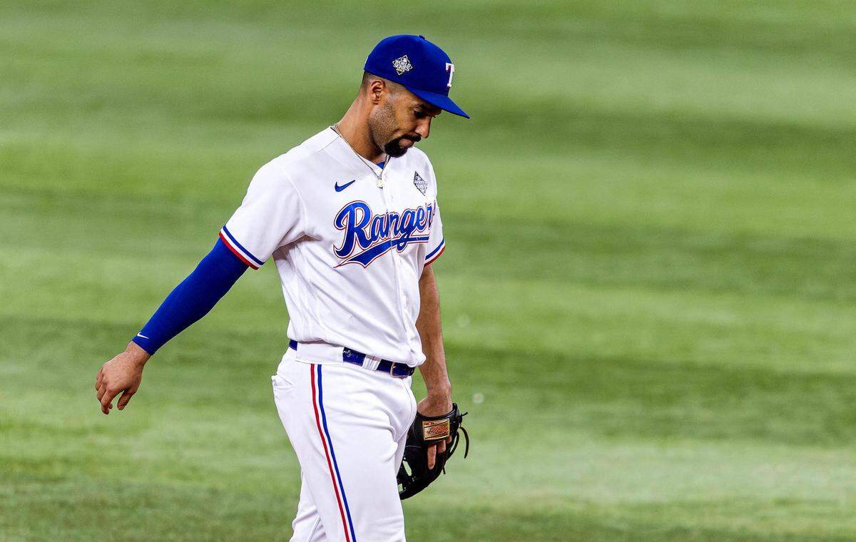 Texas Rangers second baseman Marcus Semien walks off the field after the Arizona Diamondbacks scored three runs in the eighth inning during Game 2 of the World Series on Saturday, October 28, 2023, at Globe Life Field in Arlington.