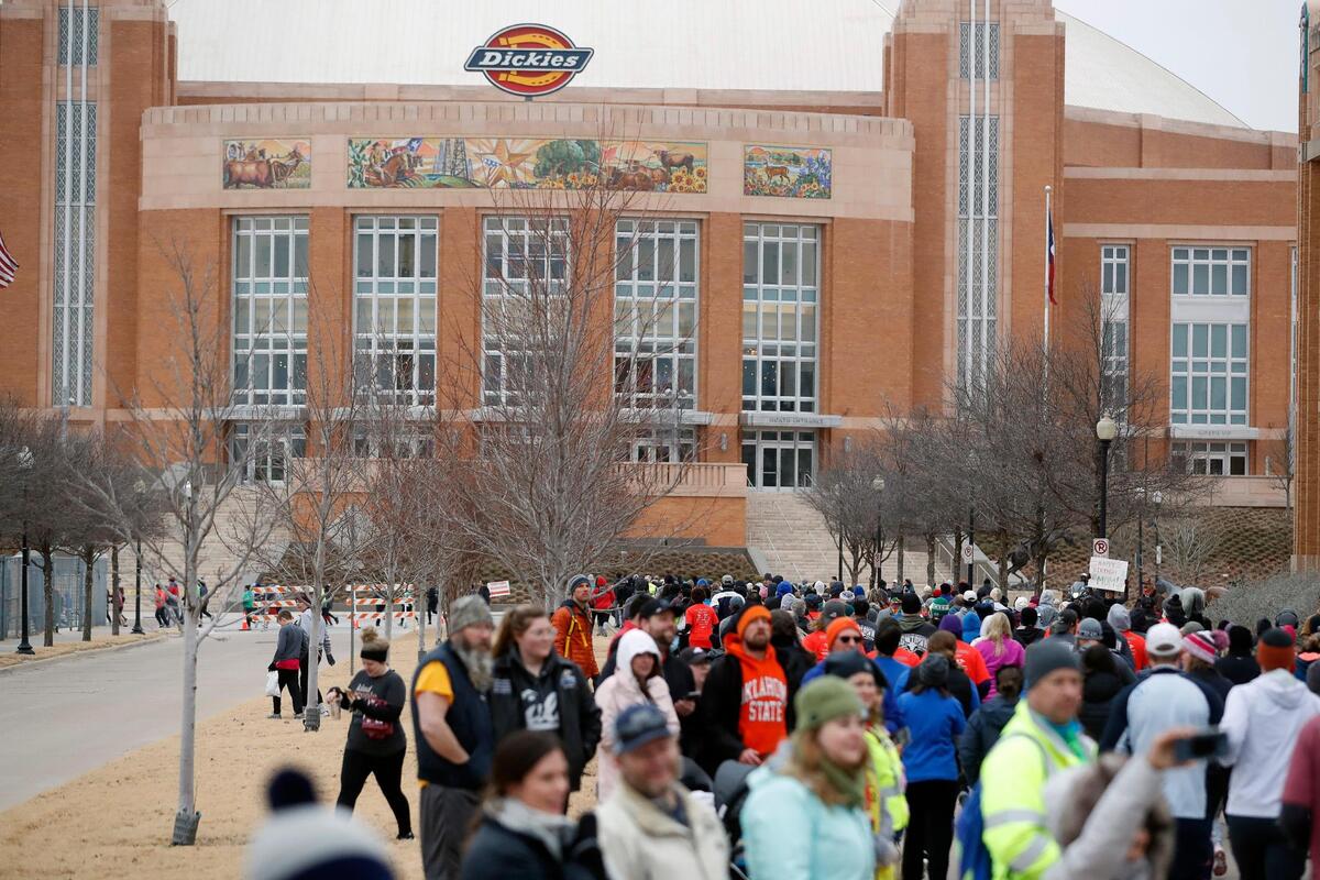 Runners start the 10K running toward then turn to the left of Dickies Arena during the 44th annual running of The Cowtown at Will Rogers Memorial Center in Fort Worth, Texas, Saturday, Feb. 26, 2022. 