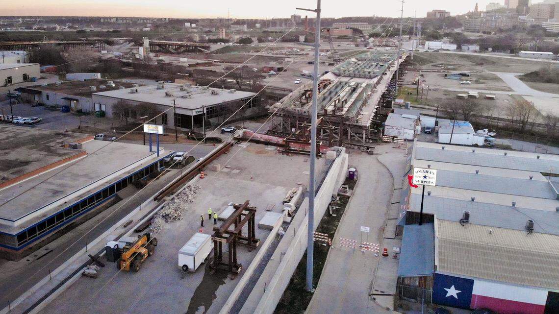 The sun rises over downtown Fort Worth as construction continues at the Panther Island bridge at White Settlement Road on Wednesday, January 8, 2020.