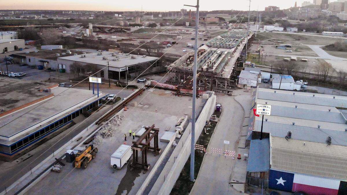 The sun rises over downtown Fort Worth as construction continues at the Panther Island bridge at White Settlement Road on Wednesday, January 8, 2020.