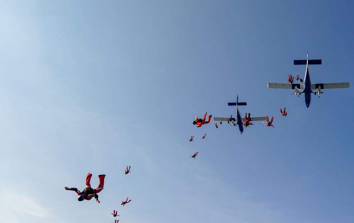Skydive Spaceland Dallas, a team of 40 jumpers, succeeded in their eighth attempt to build a true-color replica of the coronavirus