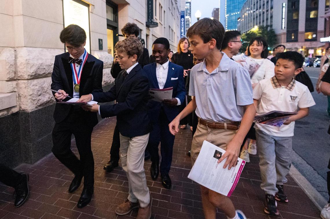Aristo Sham of Hong Kong, China signs autographs after winning the Nancy Lee and Perry Bass Gold Medal award and Van Cliburn Winners Cup during the Van Cliburn International Piano Competition Awards Ceremony at Bass Performance Hall in Fort Worth on Saturday, June 7, 2025.