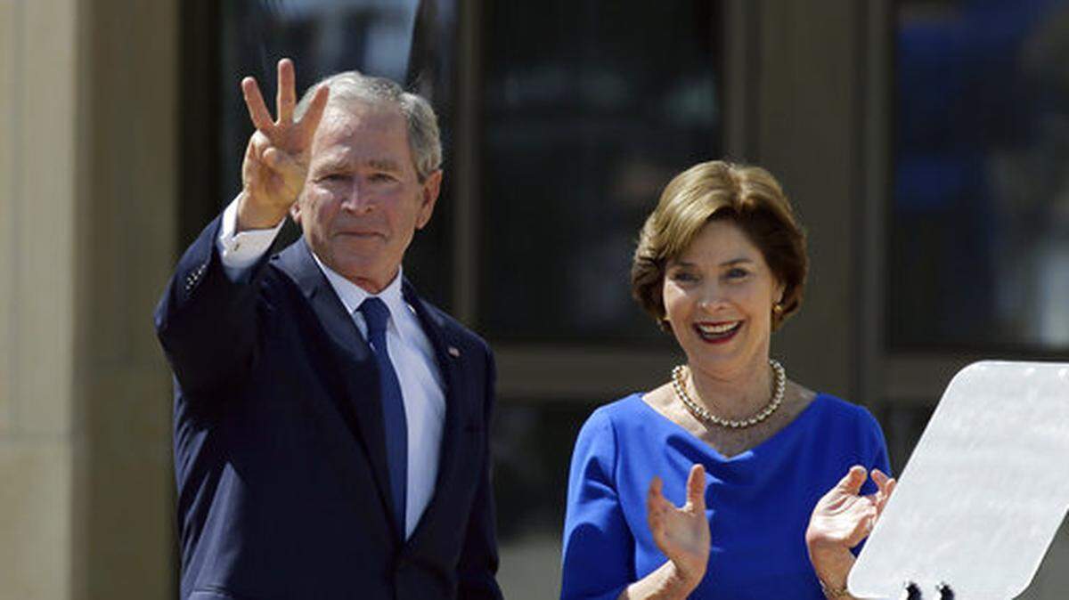 Former President George W. Bush is campaigning for Republican candidates. In this 2013 photo, he was accompanied by his wife, former first lady Laura Bush.