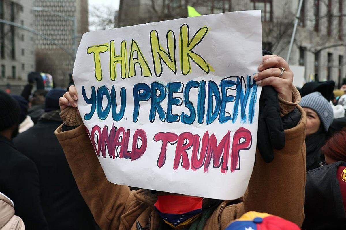 NEW YORK, NEW YORK - JANUARY 05: A person holds a sign that reads "Thank You President Donald Trump" outside of the Daniel Patrick Moynihan United States Courthouse before the arraignment of President of Venezuela Nicolas Maduro's and first lady Cilia Flores on January 05, 2026 in New York City. Maduro and first lady Cilia Flores landed in New York on Saturday after they were captured by the U.S. military in CaracÃ¥as. They are being detained at the Metropolitan Detention Center in Brooklyn and are expected to face federal charges related to drug trafficking and working with gangs designated as terrorist organizations. (Photo by Michael M. Santiago/Getty Images)