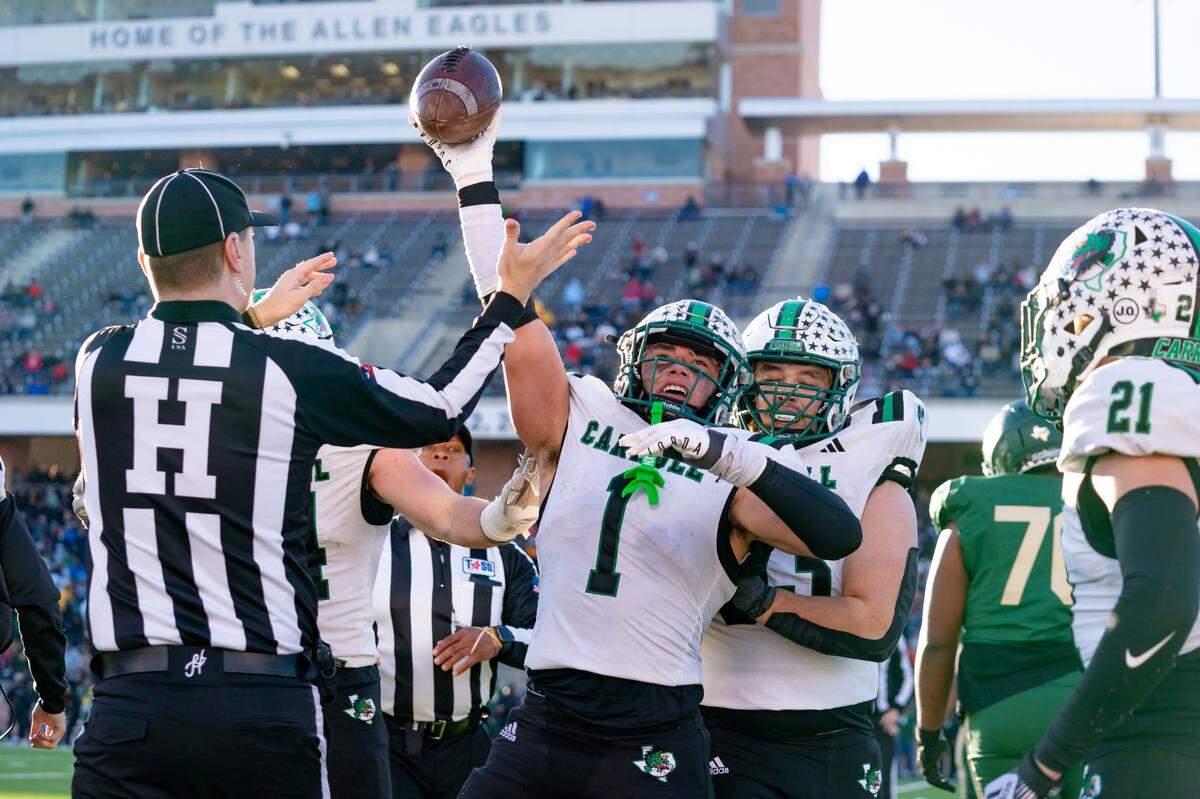 Southlake Carroll defensive back Angel Garza celebrates after a fumble recovery in a state semifinal game against DeSoto in Allen, Texas on Dec. 9, 2023.
