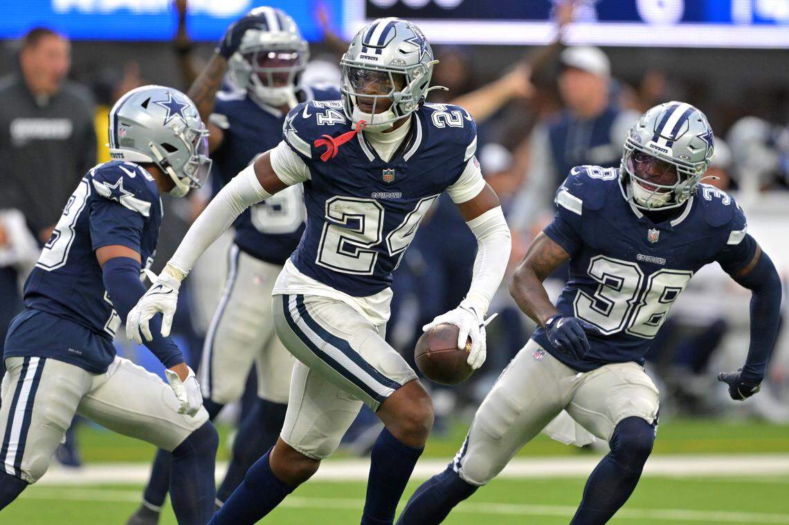 Aug 9, 2025; Inglewood, California, USA; Dallas Cowboys safety Israel Mukuamu (24) celebrates after an interception during the second half against the Los Angeles Rams at SoFi Stadium. Mandatory Credit: Jayne Kamin-Oncea-Imagn Images