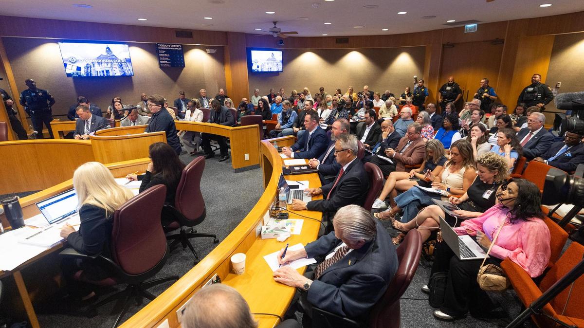 Meeting attendees pack the court room for a Tarrant County Commissioners Court meeting at the Tarrant County Administration Building in Fort Worth on Tuesday, June 3, 2025. 