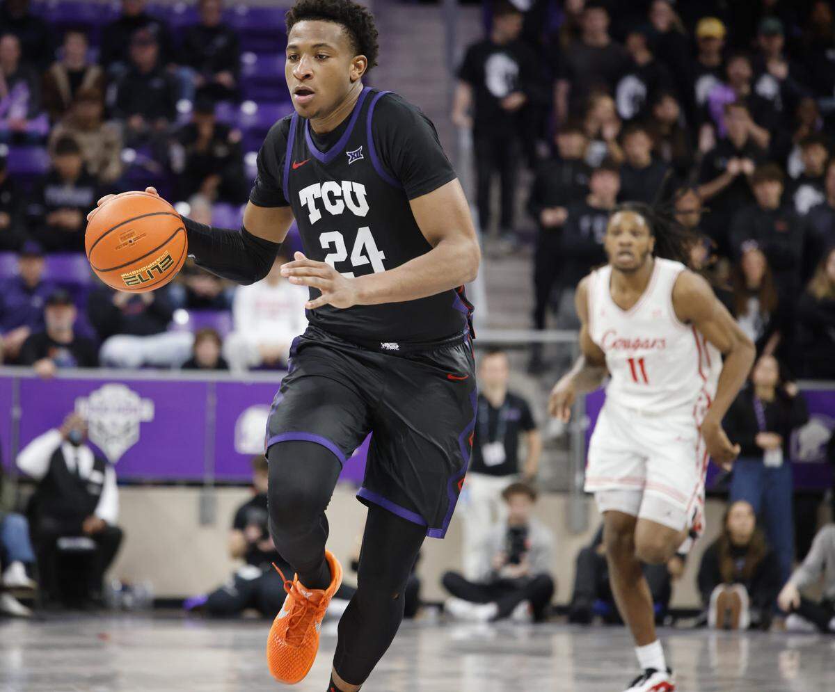 TCU forward Xavier Edmonds (24) brings the ball down court after his steal from Houston during the second half of a NCAA basketball game between the University of Houston and TCU at Schollmaier Arena in Fort Worth, Texas, Wednesday Jan. 26, 2026