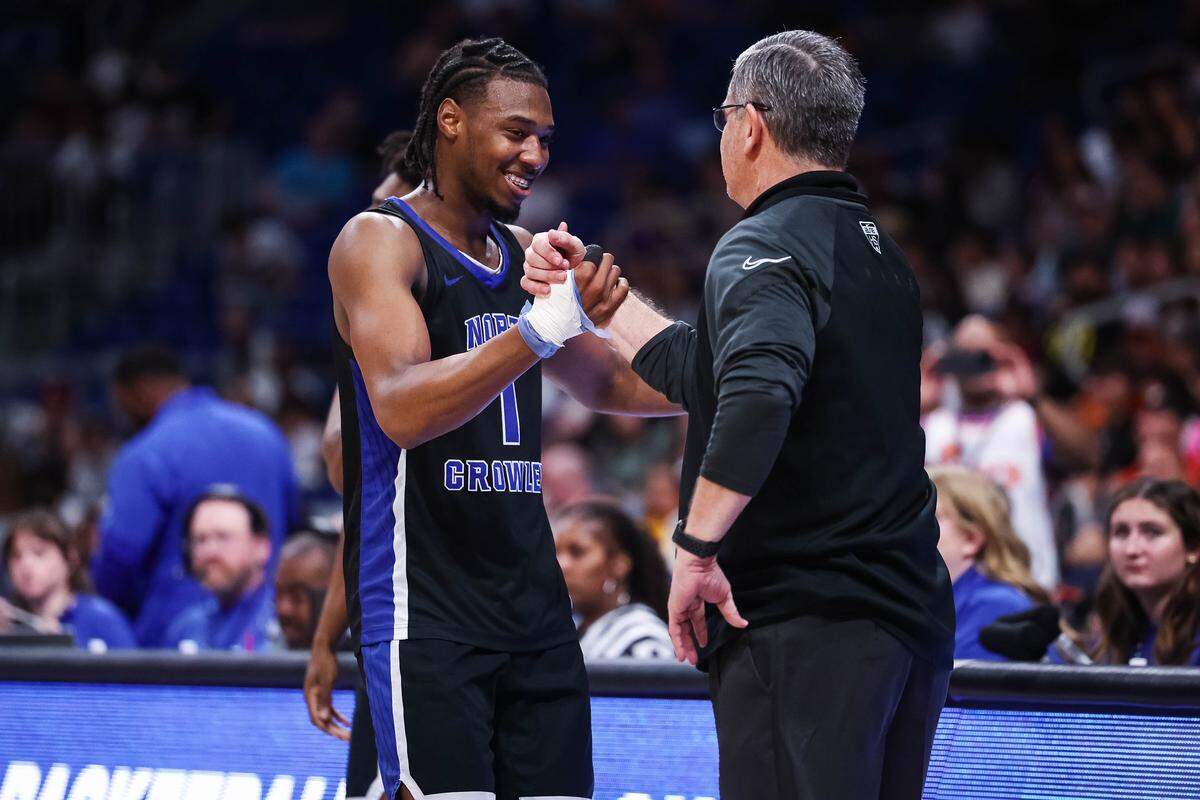 North Crowley forward Alex Barther II shakes hands with head coach Tommy Brakel in the Class 6A Division I state championship against San Antonio Brennan on Saturday at the Alamodome in San Antonio.