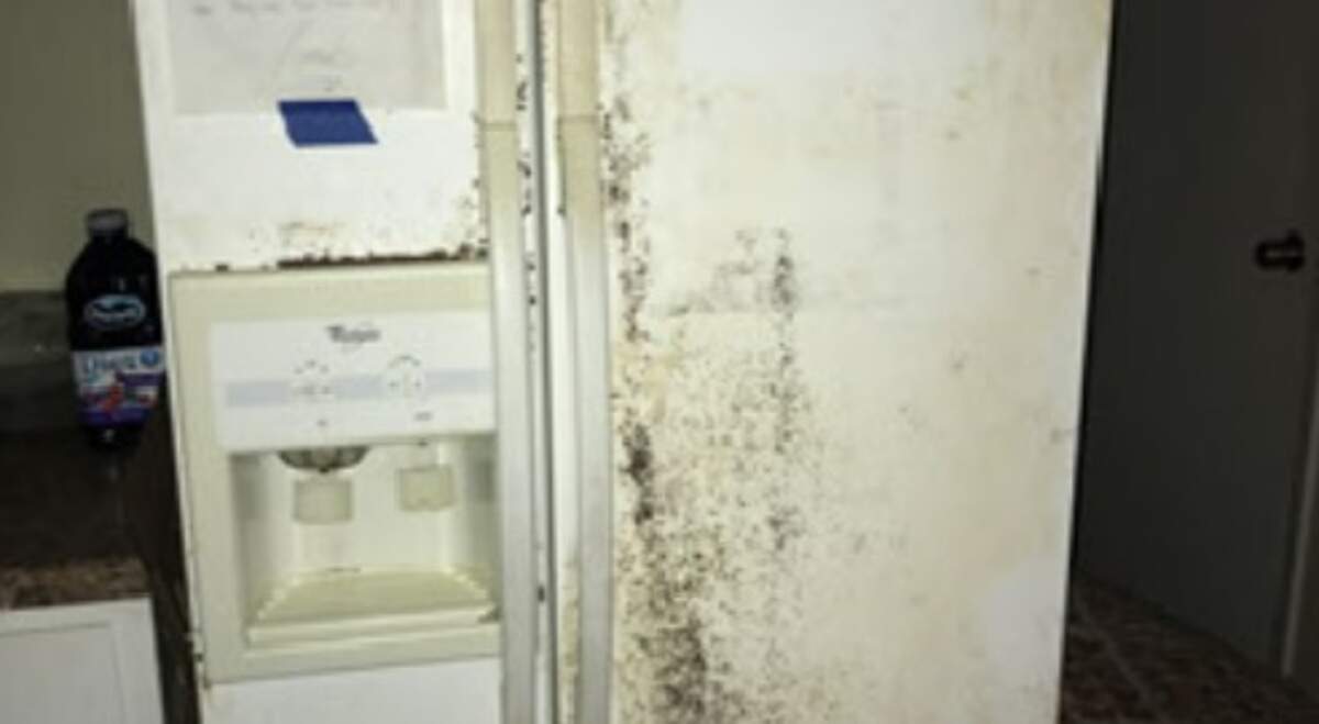 Members of the Fort Worth police department’s Crisis Intervention Team found people living in squalor after they received a service call to this boarding home.