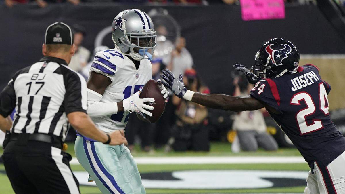 Cowboys wide receiver Allen Hurns scores a touchown in front of Houston Texans cornerback Johnathan Joseph in the first half of Sunday’s 19-16 overtime loss.