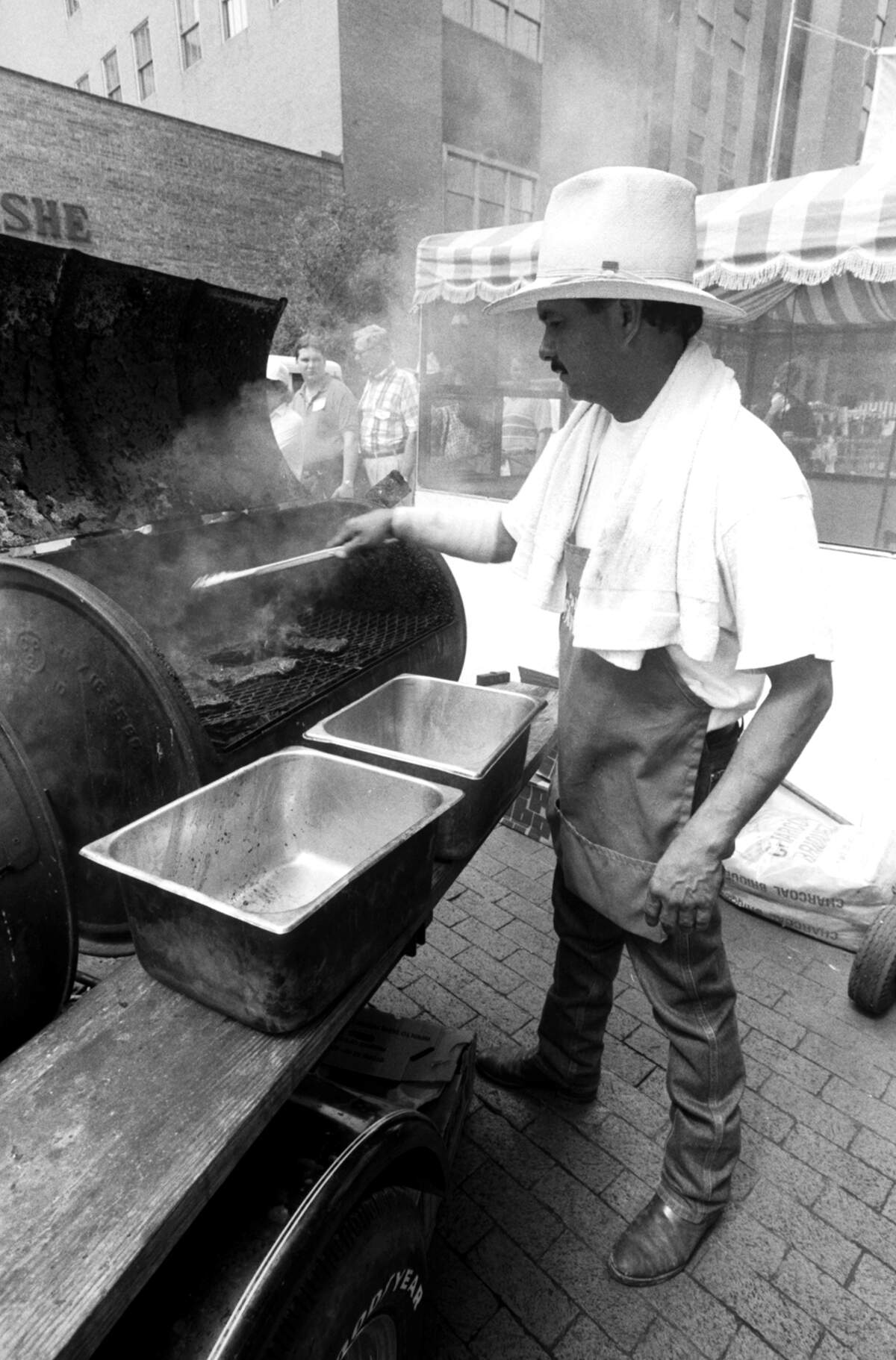 Sept. 13, 1990: Bob Pena, from the Hallmark neighborhood, cooks fajitas for the Mexican Independence Day festival’s crowd.