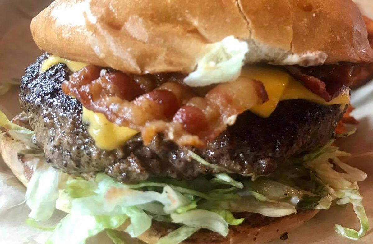 The ‘Bacon Love #9’ at Grub Burger Bar: applewood-smoked bacon, American cheese, lettuce, tomatoes, pickles, ‘Secret Sauce #9.’