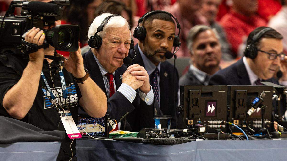 He’s 80, and CBS broadcaster Bill Raftery (left) is one of the most recognizable people associated with college basketball. He will call the NCAA Final Four this weekend along with former Duke and NBA All-Star Grant Hill (right).