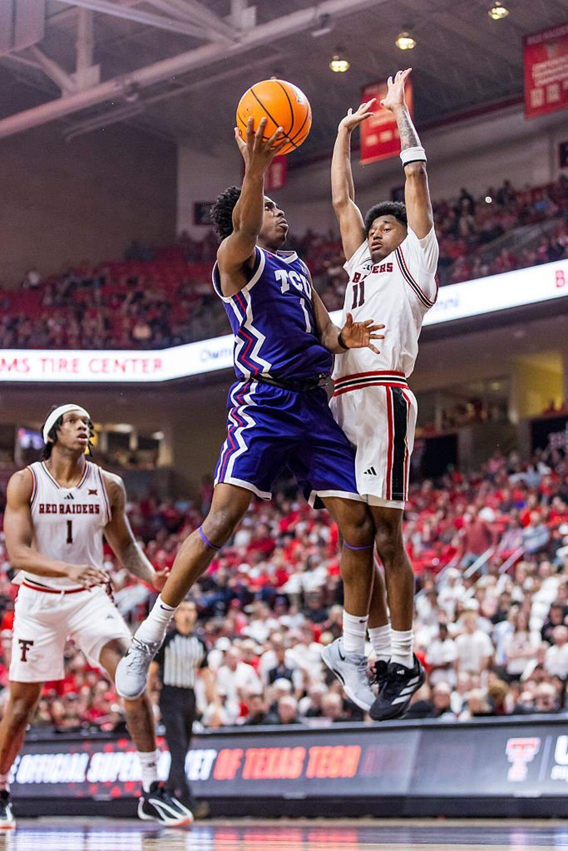 LUBBOCK, TEXAS - MARCH 03: Jayden Pierre #1 of the TCU Horned Frogs shoots the ball against Jaylen Petty #11 of the during the second half of the game at United Supermarkets Arena on March 03, 2026 in Lubbock, Texas. (Photo by John E. Moore III/Getty Images)