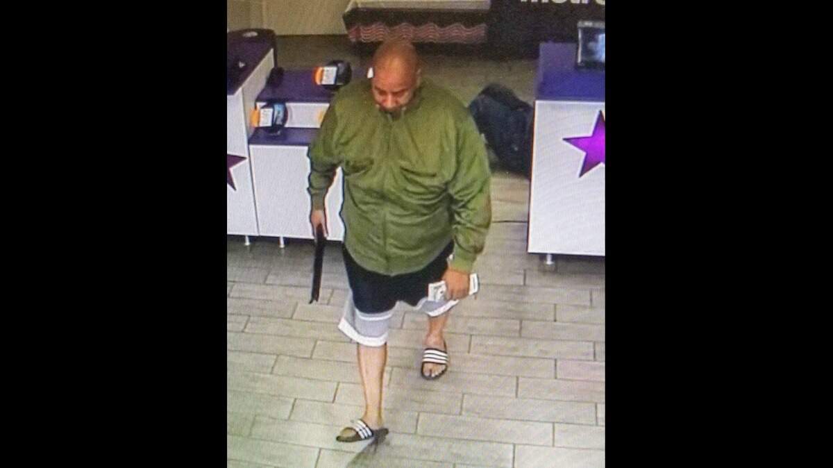 The male suspect in North Texas is wanted for a robbery with a long gun inside a MetroPCS store in early July, according to the Denton Police Department.