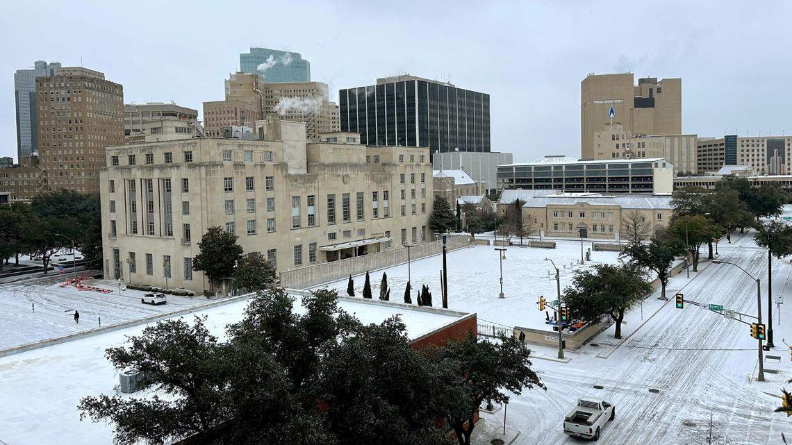 Downtown Fort Worth is covered in a light layer of snow on Monday, January 15, 2024.