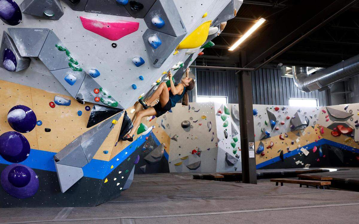 Annie Sanders, 15, practices boulder climbing at Movement Grapevine on Monday, September 25, 2023.