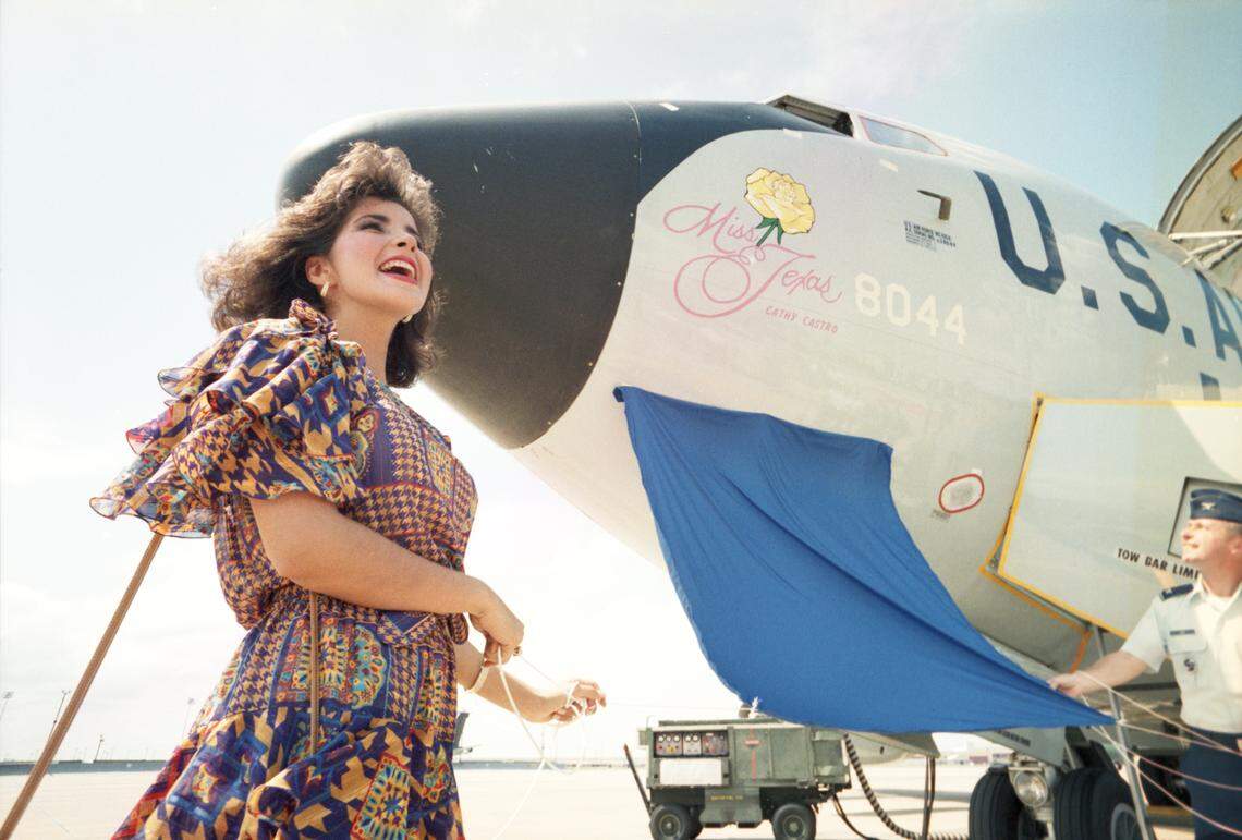Sept. 20, 1988: Miss Texas, Cathy Castro, unveils her name with a yellow rose embellishment on an Air Force KC-135 tanker at Carswell Air Force Base with the help of Col. John B. Sams, commander of the 7th Bomb Wing. She was a TCU graduate in 1992.