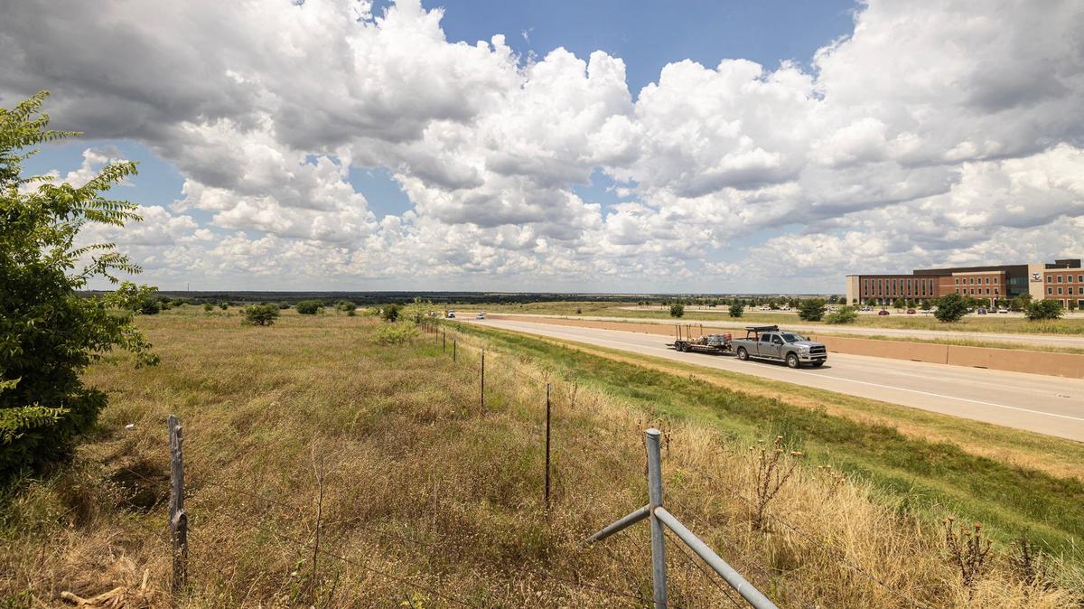 A plot of land off Old Granbury Road bordering the Chisholm Trail Parkway tollroad is the subject of a monthslong debate between developers hoping to construct a massive mixed-use development and a group of resistant nearby homeowners.