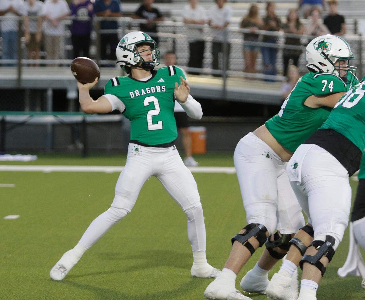 Southlake Carroll’s quarterback Angelo Ronda throws a pass during a UIL football game at Dragon Stadium on Friday, Sept. 27, 2024.