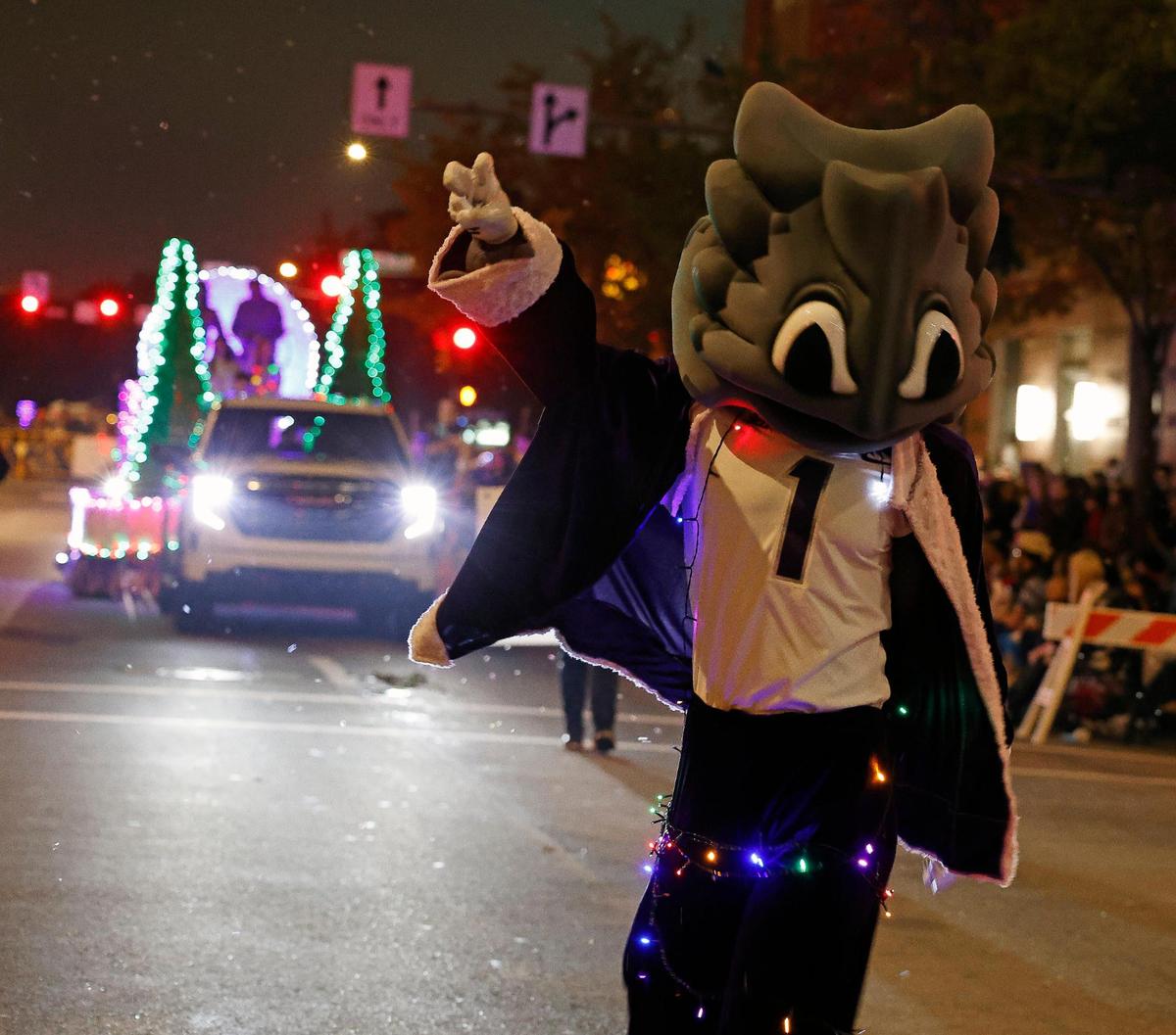 TCU Super Frog led the float for TCU’s 150th anniversary during the 2023 GM Financial Parade of Lights.