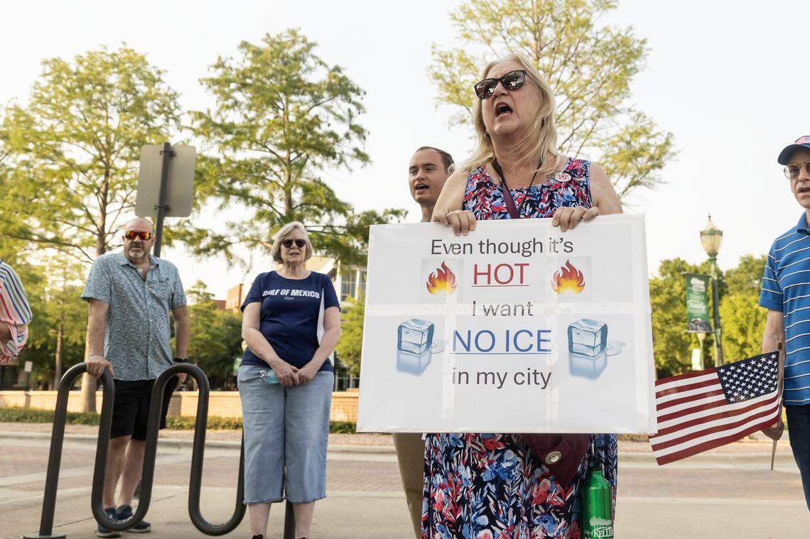 Keller resident Karen Trost joins in chants with the protesters prior to the Keller City Council meeting at Keller Town Hall on Tuesday, Aug. 5, 2025. Protesters gathered to reject Item 287g on the Keller council meeting agenda is a resolution for the city to join forces with ICE.