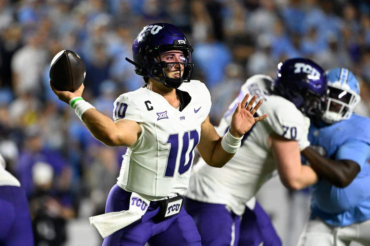 Sep 1, 2025; Chapel Hill, North Carolina, USA; TCU Horned Frogs quarterback Josh Hoover (10) passes the ball in the first quarter at Kenan Stadium. Mandatory Credit: Bob Donnan-Imagn Images