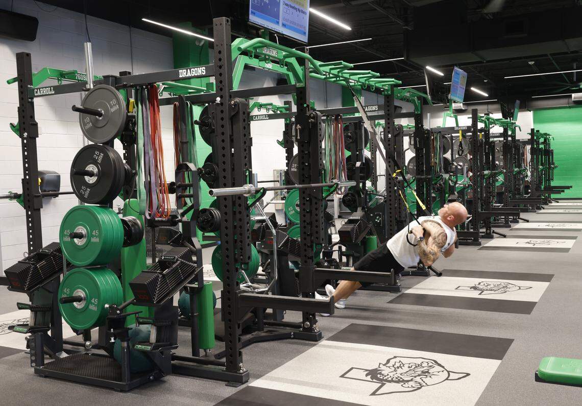 Strength coach Doug Castleberry working out in the weight room