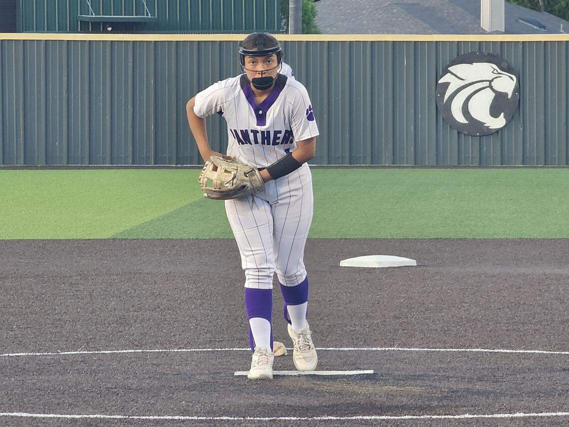 Fort Worth Paschal pitcher Angela Cisneros gets ready to deliver a pitch against Cleburne in a Class 5A Division I bi-district softball game on Friday, April 24, 2026 at Wildcat Field in Kennedale, Texas.