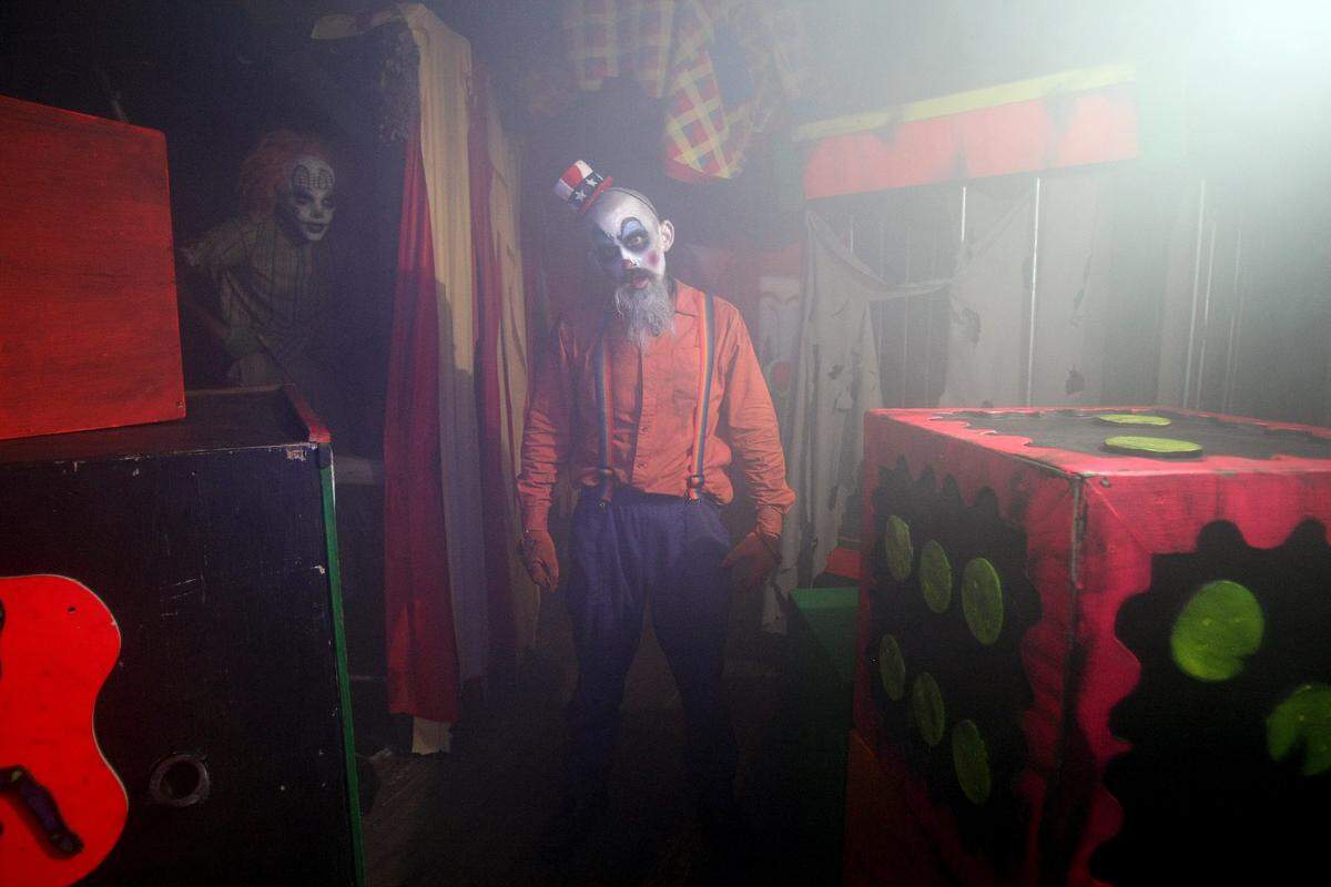 John Hudnall of Fort Worth plays a clown at Cutting Edge Haunted House in Fort Worth on Oct. 20, 2011.