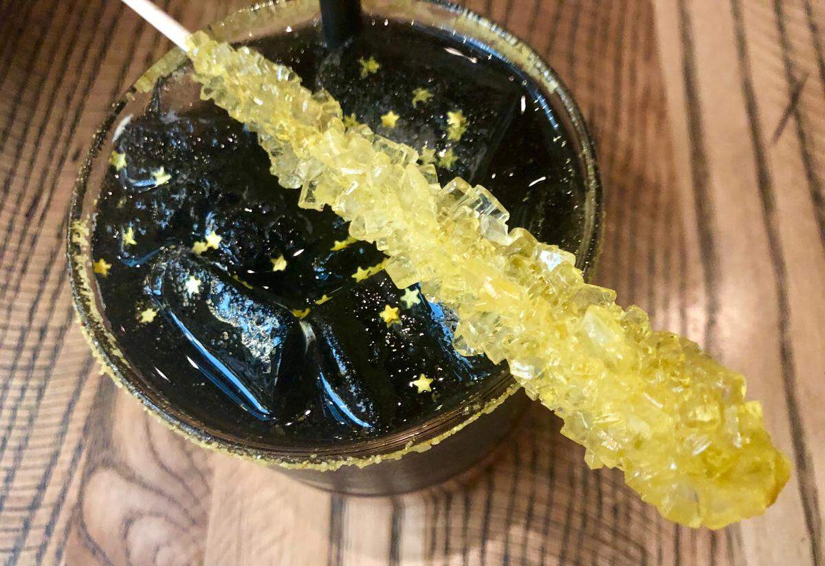 The “Oil Man” is a charcoal margarita at El Bolero in Crockett Row.