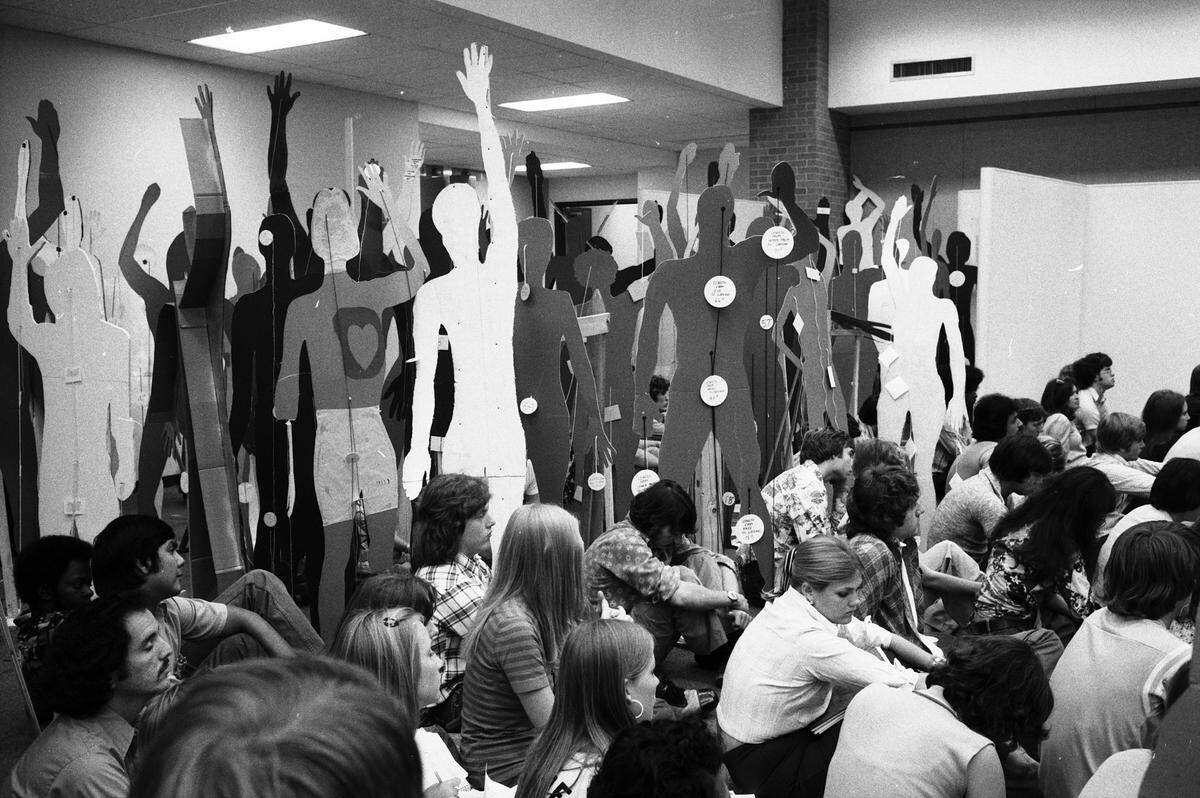 Oct. 14, 1975: University of Texas at Arlington architecture professor Anthony Antoniades and his freshmen students made cardboard doubles of themselves to illustrate the space needed in a structure to allow each person a “bubble of comfort.” Such needs must be considered in architecture, Antoniades says.