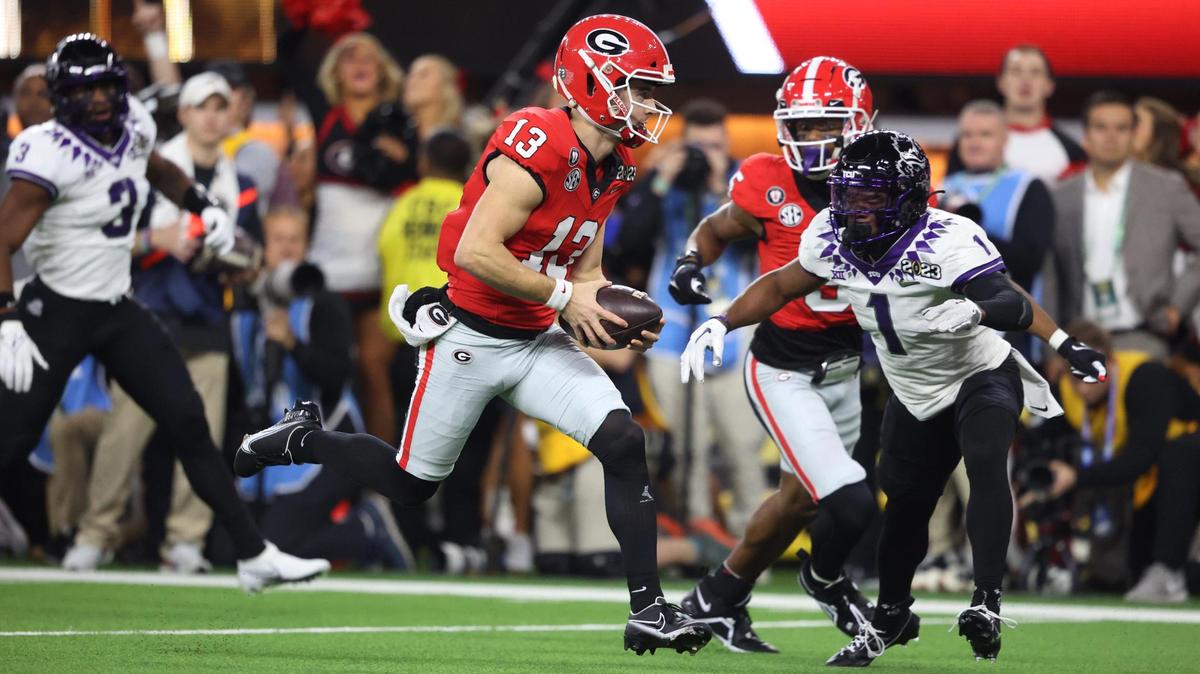 Georgia Bulldogs quarterback Stetson Bennett runs in for a touchdown in the first quarter against TCU during the College Football Playoff National Championship on Monday, Jan. 9, 2023, at SoFi Stadium in Inglewood, Calif.