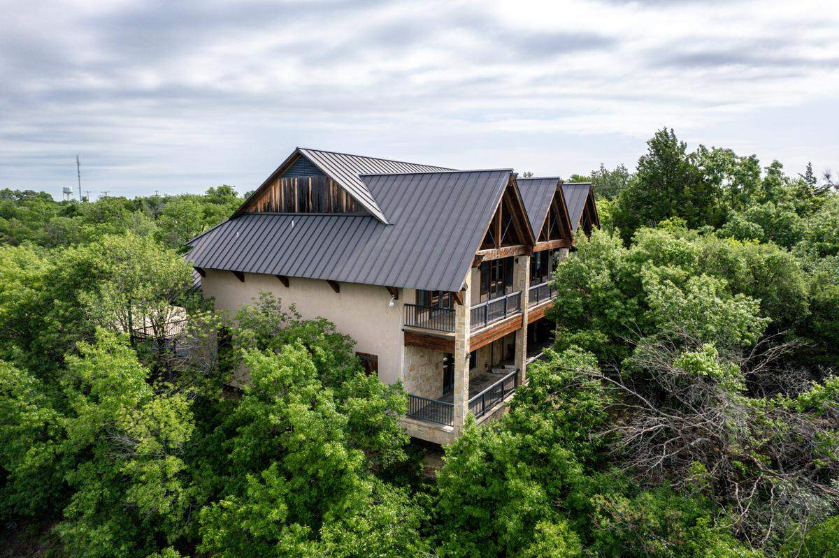 9930 Boat Club Road has two guest house, this one being 4,950 square feet with privacy from surrounding trees.