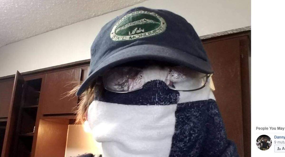 Daniel Mashburn changed his Facebook profile picture Thursday to a face wrapped in a scarf,  after he was suspended indefinitely for scaring students by lecturing with his face covered, and ranting about religion on Tuesday.
