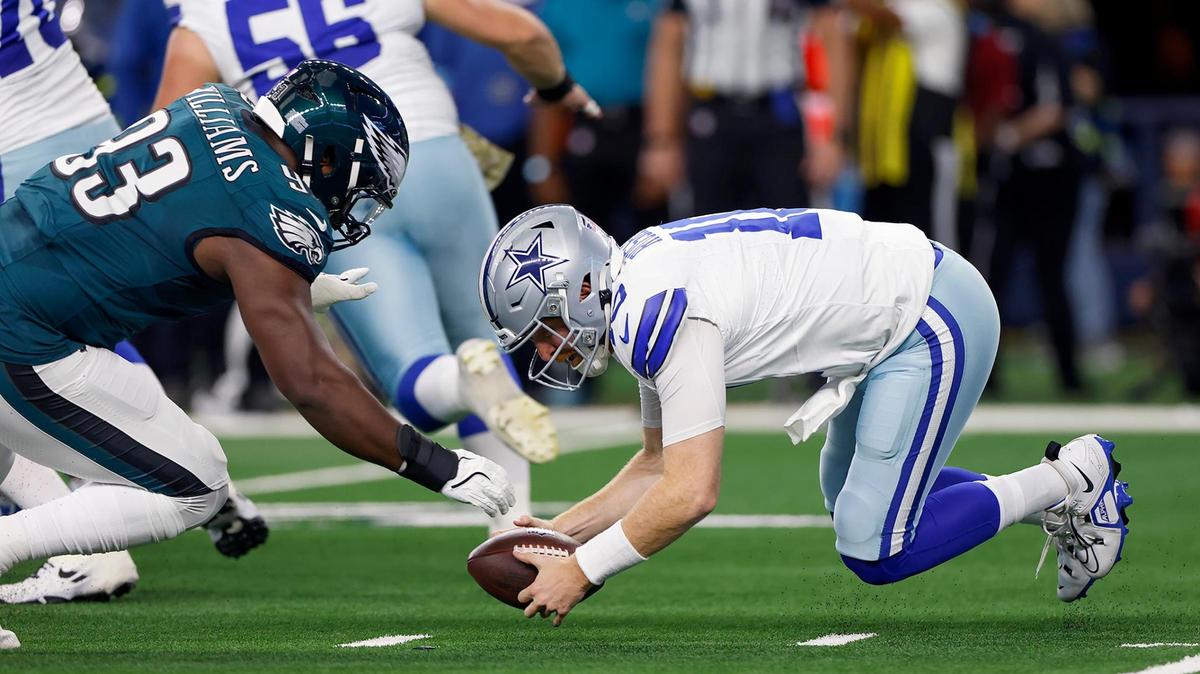 Dallas Cowboys quarterback Cooper Rush attempts to recover the ball after fumbling it against the Philadelphia Eagles on Sunday, Nov. 10, 2024, at AT&T Stadium. The ball was recovered by Eagles defensive tackle Milton Williams, left.