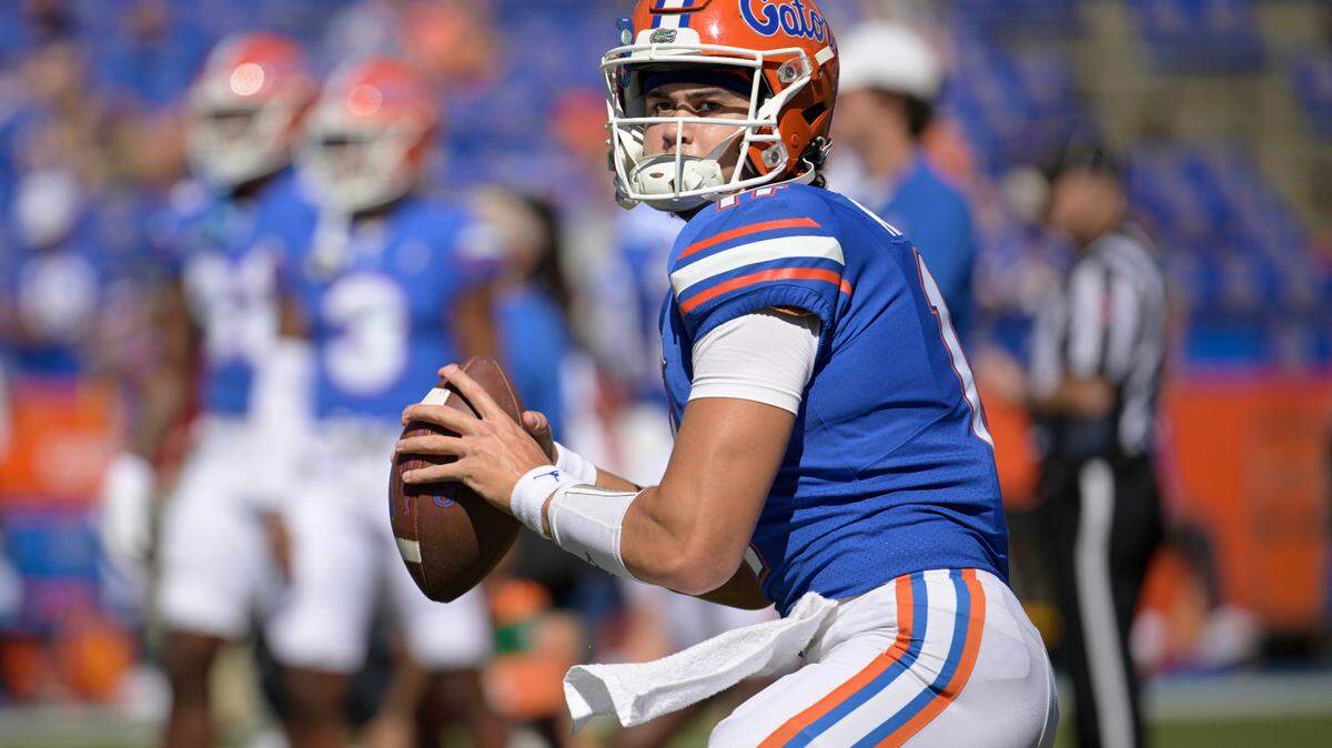 Florida backup quarterback Jalen Kitna was arrested Wednesday and charged with two counts of distribution of child exploitation material and three counts of possession of child pornography. He starred at Burleson High School, where he played for this father, former Cowboys QB Jon Kitna.