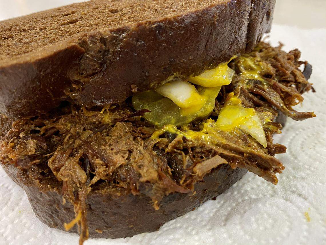 The Angelo’s chopped beef sandwich, shown here on dark bread.