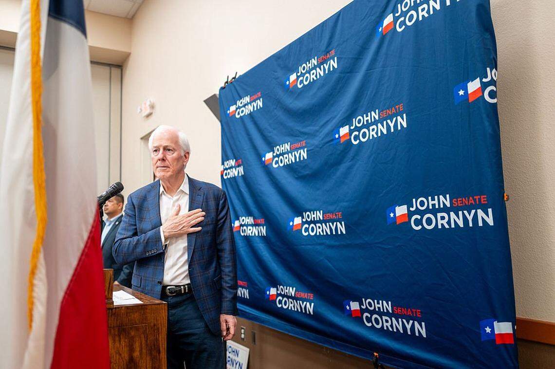 SCHERTZ, TEXAS - MARCH 02: Sen. John Cornyn (R-TX) leads the Texas Pledge of Allegiance during a Get Out The Vote campaign rally at the Schertz Civic Center Conference Hall on March 02, 2026 in Schertz, Texas. Cornyn continues to campaign against opponents Texas Attorney General Ken Paxton, and Rep. Wesley Hunt (R-TX) ahead of the March 3 primary election. (Photo by Brandon Bell/Getty Images)