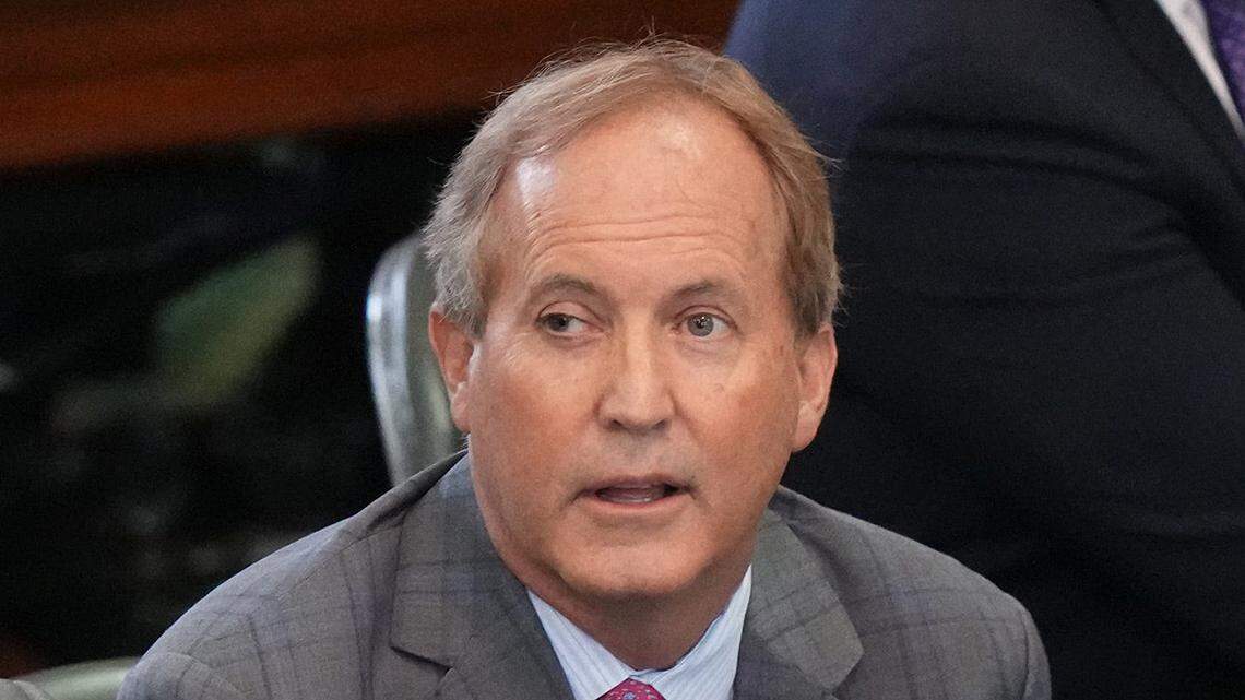 Attorney General Ken Paxton, right, waits with his attorney Tony Buzbee for closing arguments to begin at his impeachment trial at the Capitol on Friday September 15, 2023.